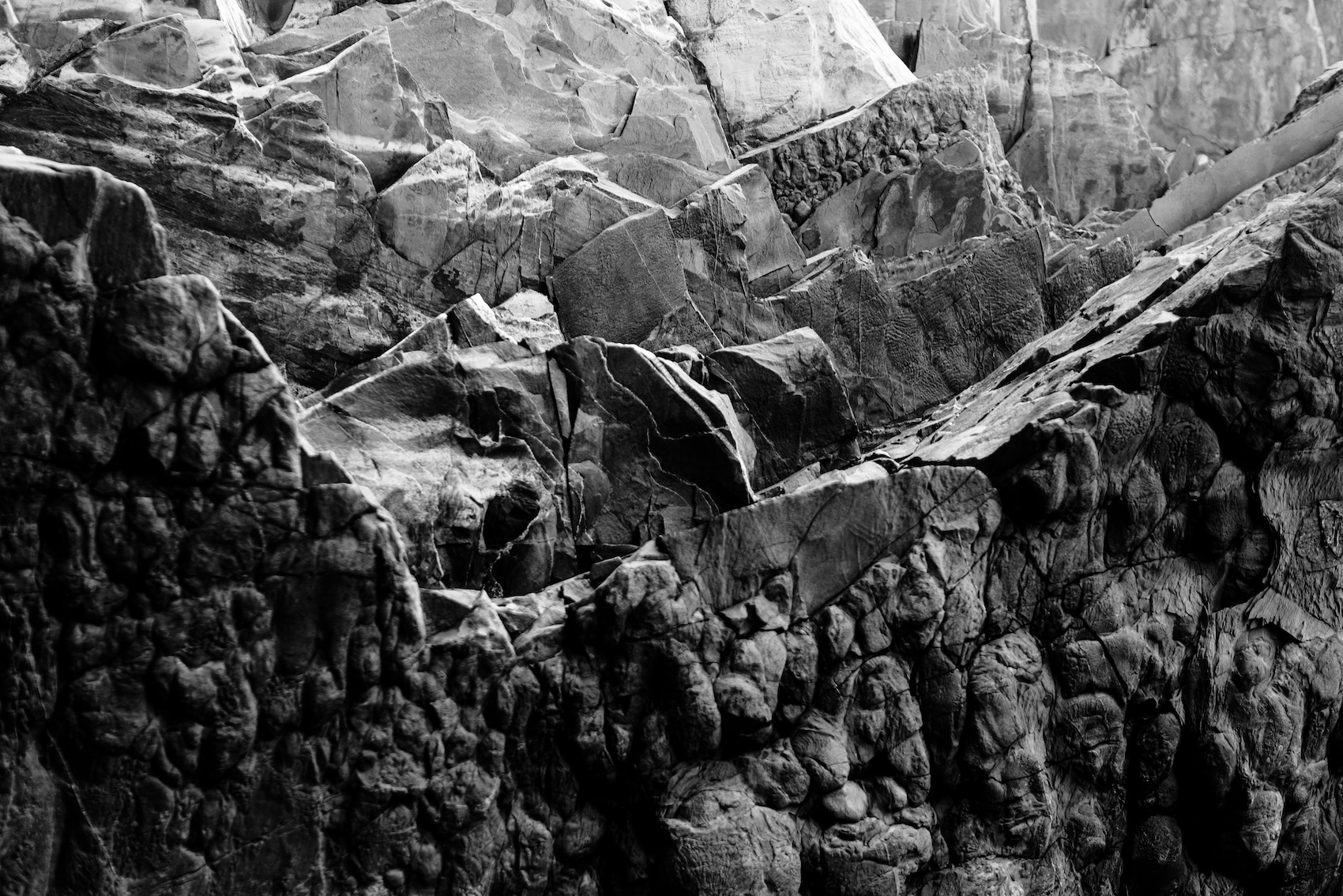 Black and white image of a rocky surface